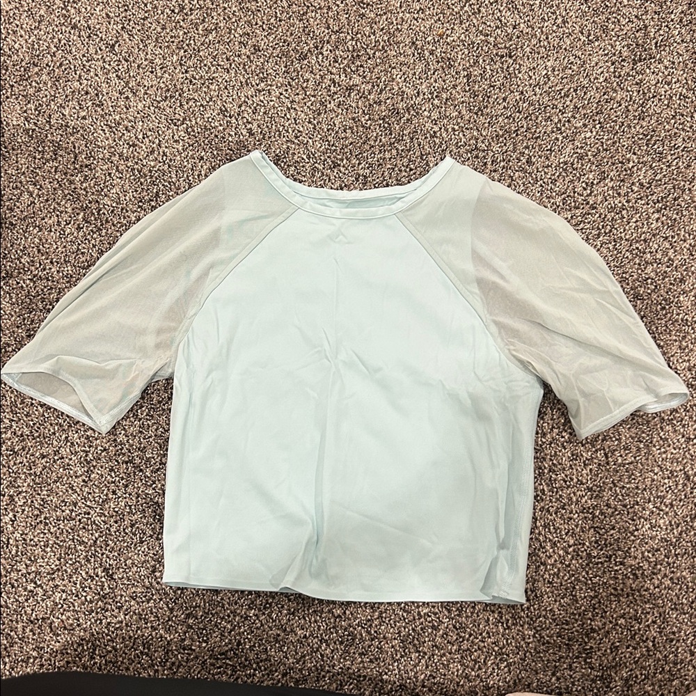Light Blue Mesh arm Lululemon size 6 top